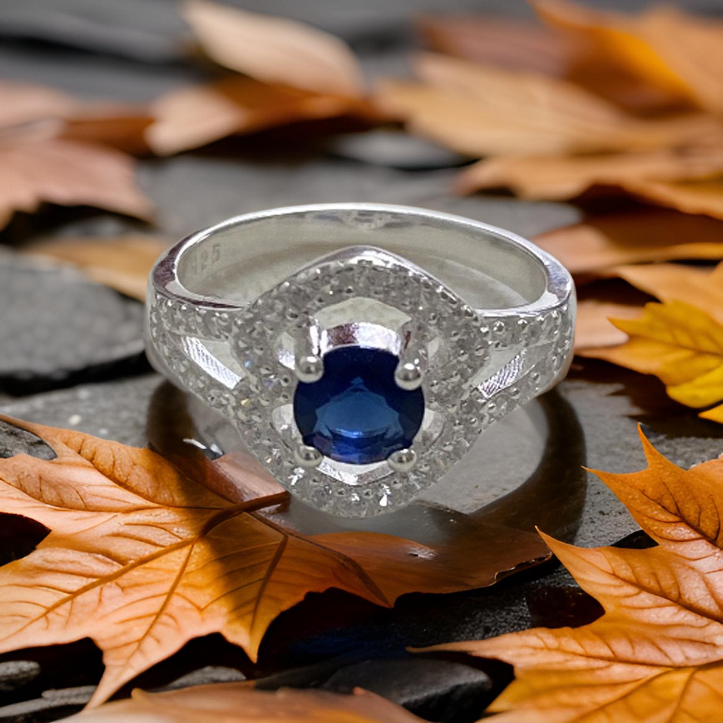 Anillo Plata Italiana 925, diseño con microcircones blancos y circon Azul