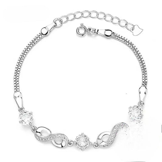 Pulsera Plata Esterlina 925 y Zircón, Color morado, Diseño infinito, Largo 16,5 cm y 4.5 cm. con extensión. Total 21 cm.