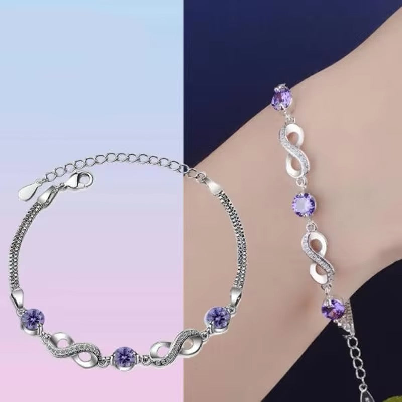 Pulsera Plata Esterlina 925 y Zircón, Color morado, Diseño infinito, Largo 16,5 cm y 4.5 cm. con extensión. Total 21 cm.