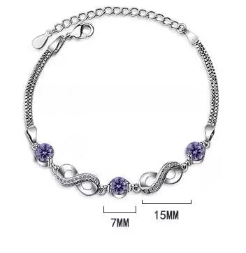 Pulsera Plata Esterlina 925 y Zircón, Color morado, Diseño infinito, Largo 16,5 cm y 4.5 cm. con extensión. Total 21 cm.
